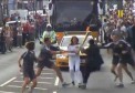 17-year-old shouts 'Allah is great' in Arabic as he tries to grab the Olympic flame from hands of terrified torch bearer